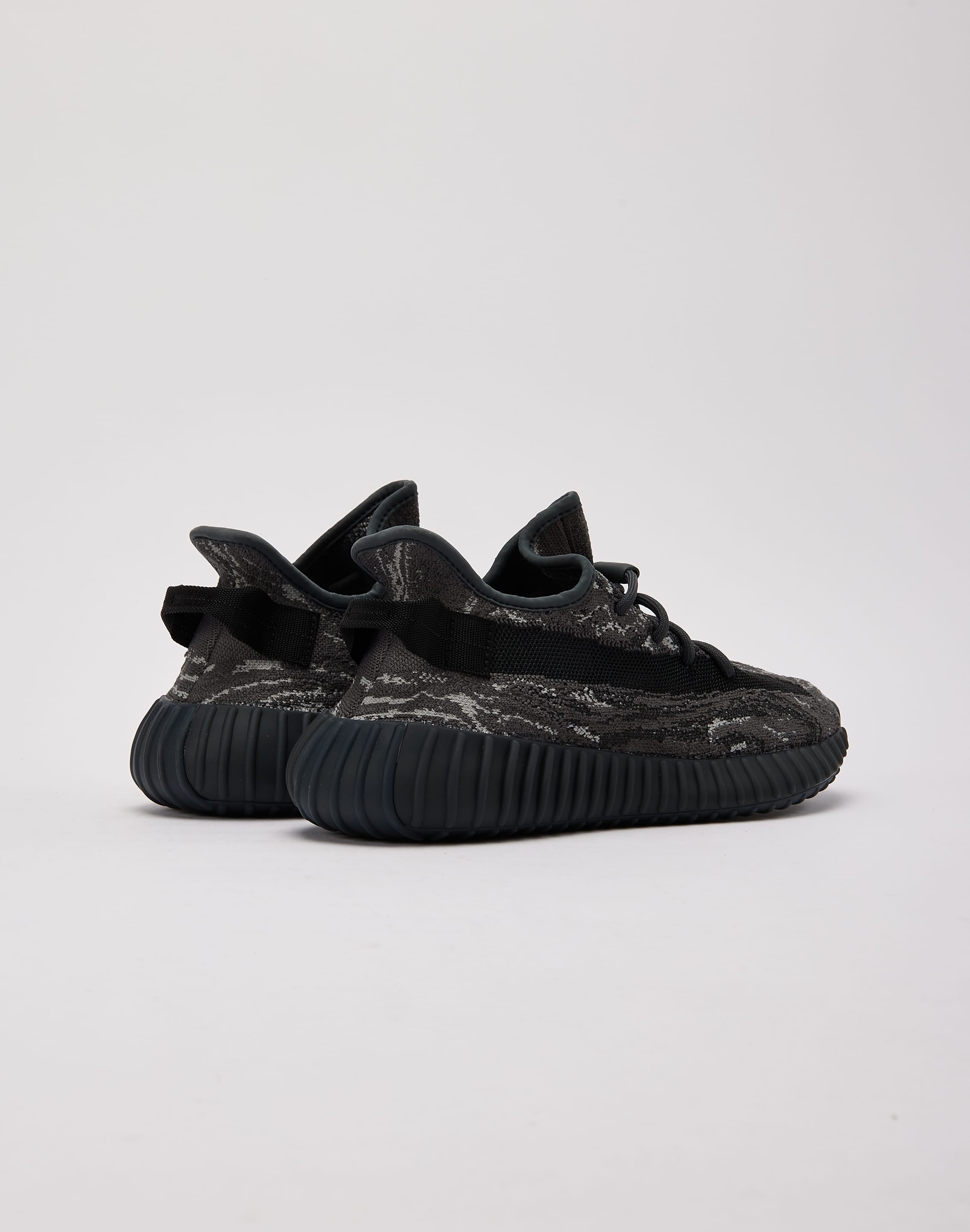 Adidas yeezy nere con schizzi on sale