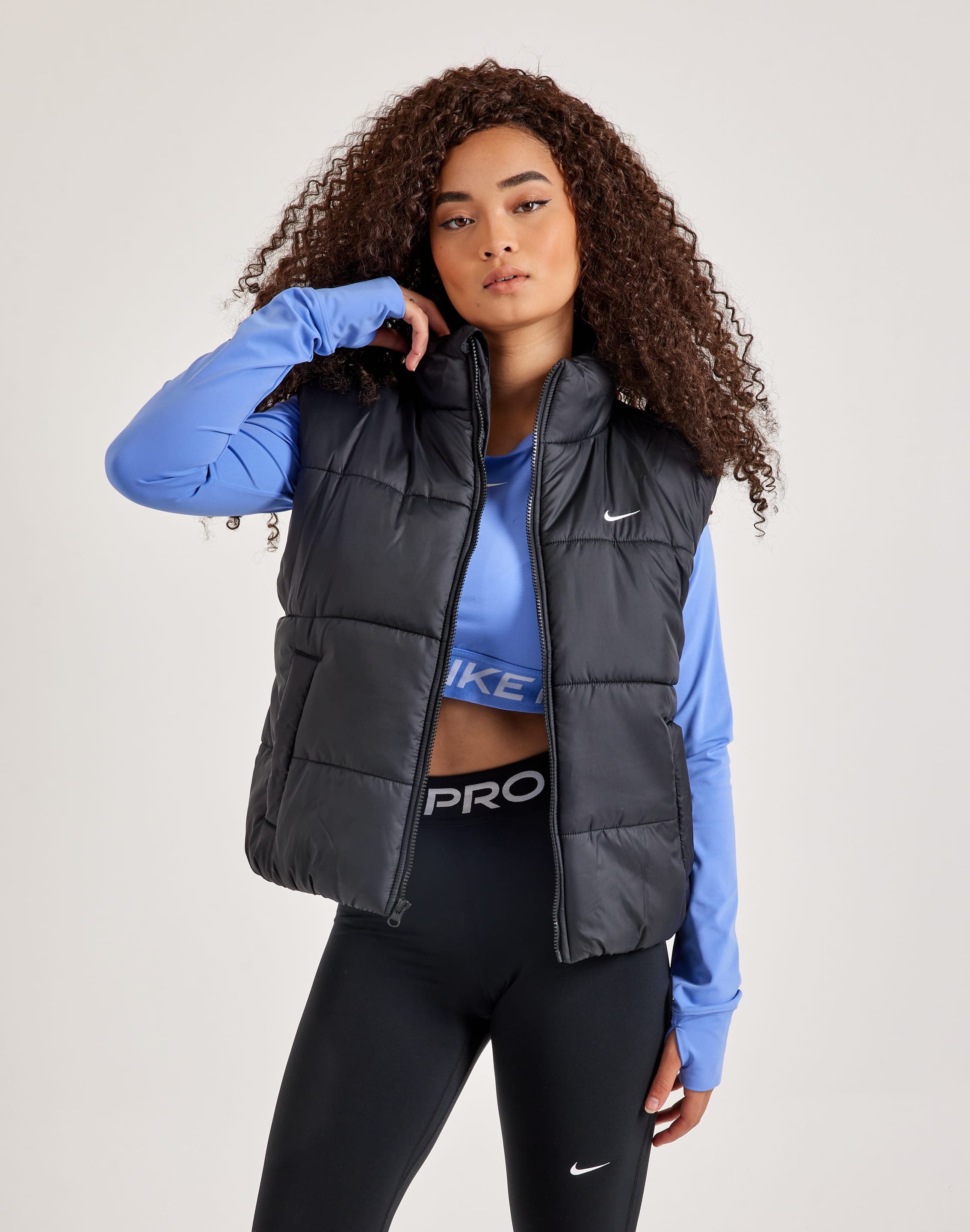 Nike puffer vest womens hotsell